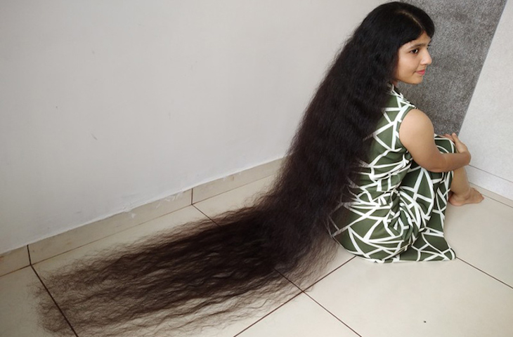 Девушка отрастила самые длинные в мире волосы после неудачной стрижки