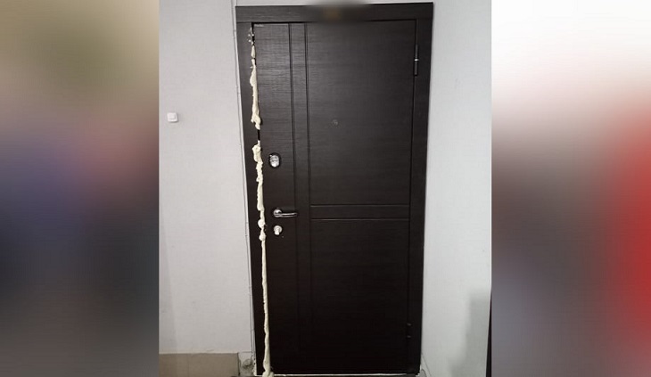 Белорус, который запенил дверь квартиры милиционера