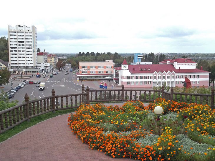 город