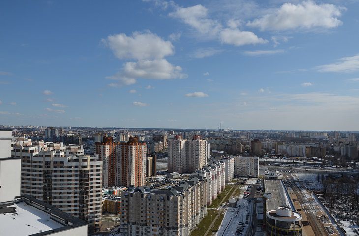 город