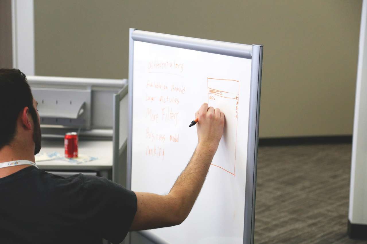Useful Tips: How to Clean a Whiteboard from a Marker person