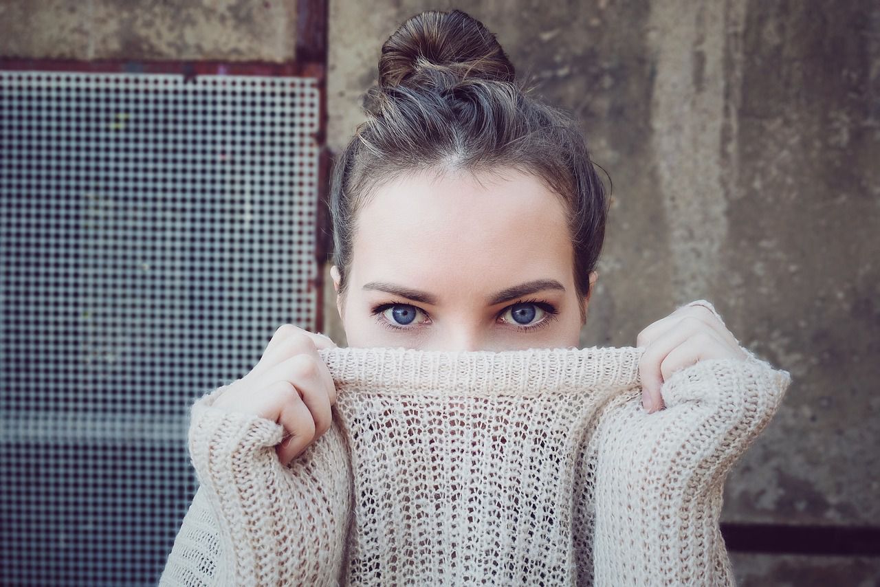 a woman in a sweater