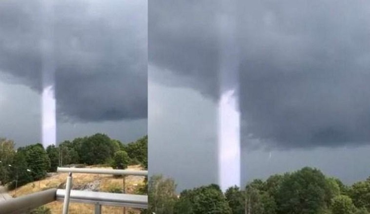 Женщина запечатлела на камеру поднимающийся к небу загадочный столб света Женщина запечатлела на камеру поднимающийся к небу загадочный столб света