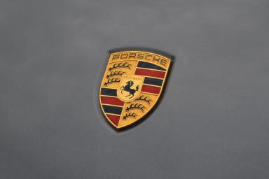 эмблема Porsche