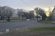 город