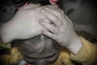 Мать избила битой спящую дочь