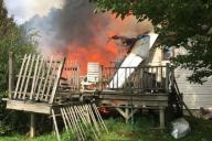 Самолет упал на жилой дом в США