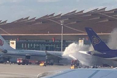 В аэропорту Пекина загорелся самолет Air China